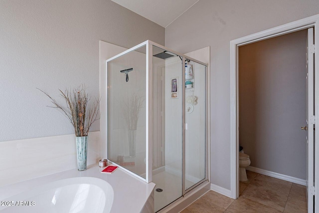 15746 E Sycamore Dr, Fountain Hills, AZ 85268 - bathroom featuring a bath, toilet, a shower stall, and tile patterned flooring