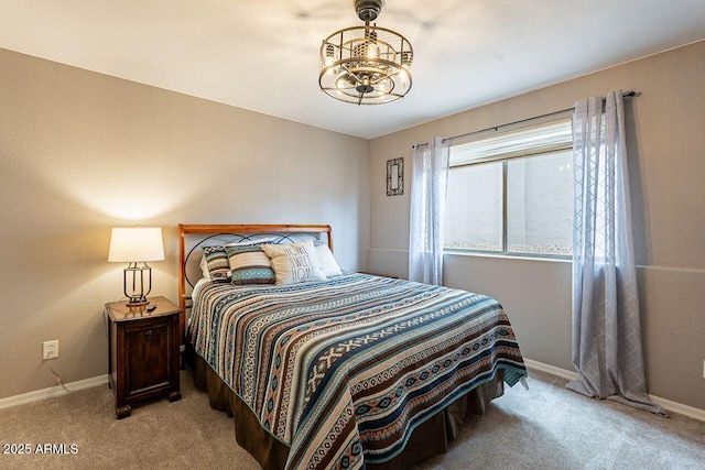 15746 E Sycamore Dr, Fountain Hills, AZ 85268 - carpeted bedroom featuring an inviting chandelier and baseboards