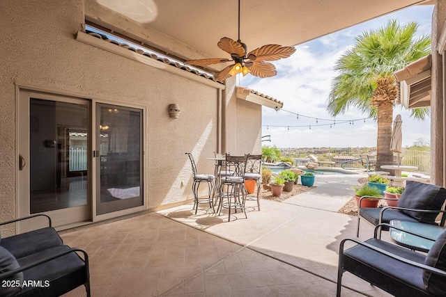 15746 E Sycamore Dr, Fountain Hills, AZ 85268 - view of patio / terrace with an outdoor pool and ceiling fan