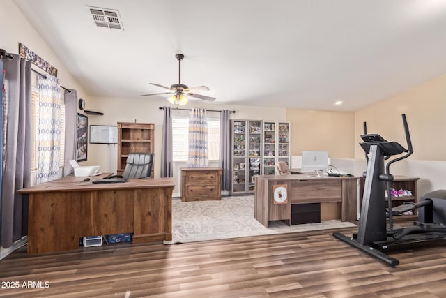 home office with vaulted ceiling, wood-type flooring, and ceiling fan