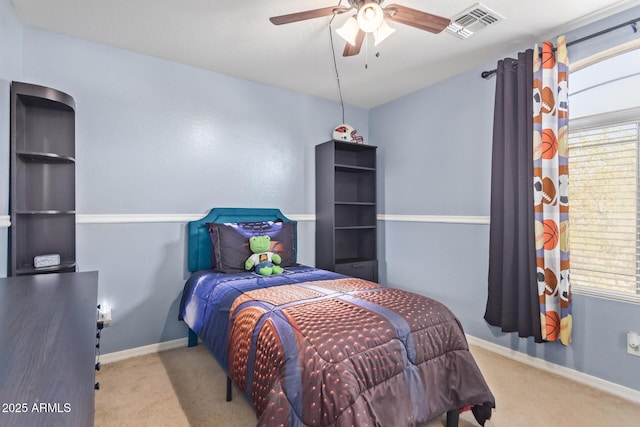 carpeted bedroom with ceiling fan