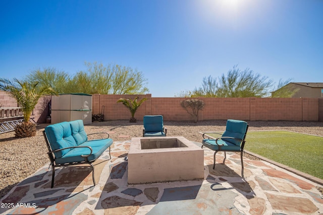 view of patio / terrace featuring a fire pit