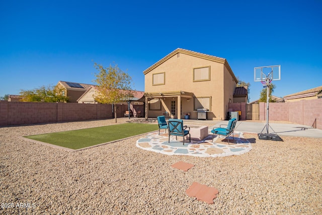 back of house featuring a patio area