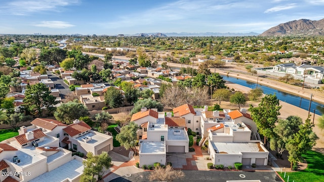 birds eye view of property with a mountain view and a residential view