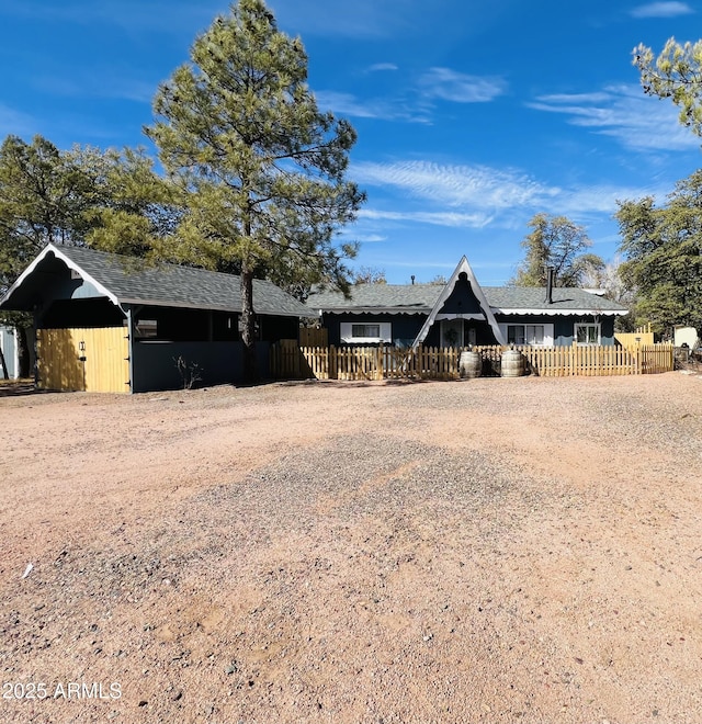 view of front of home with fence