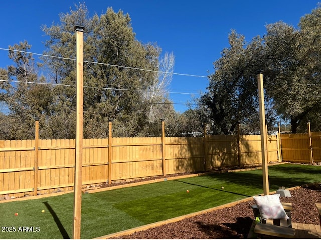 view of yard featuring a fenced backyard