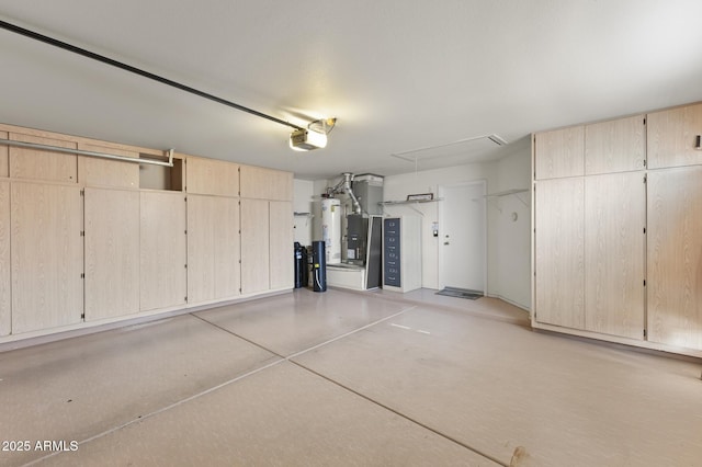 garage featuring a garage door opener and gas water heater