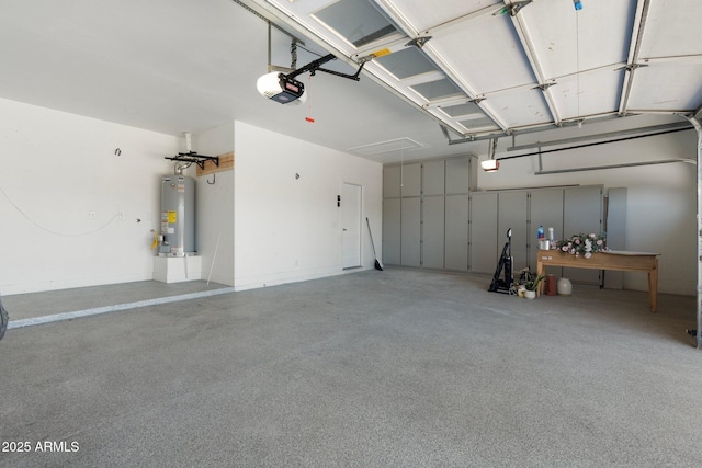 garage with a garage door opener and gas water heater