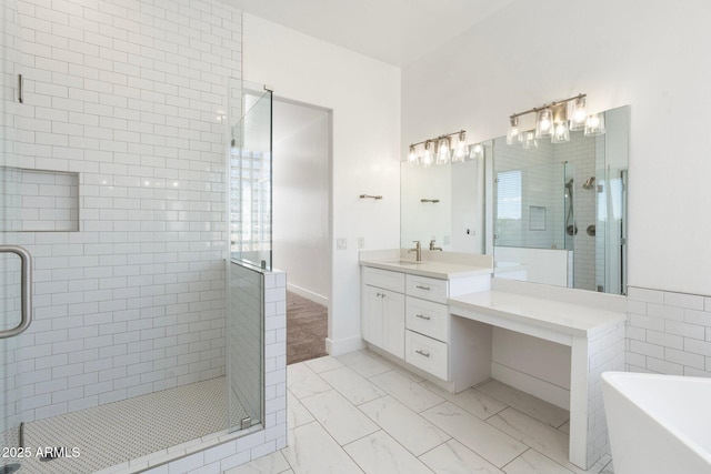 bathroom with vanity and independent shower and bath