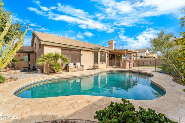 view of swimming pool featuring a patio area