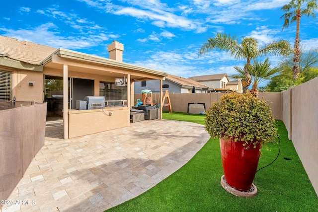 view of patio / terrace with exterior kitchen