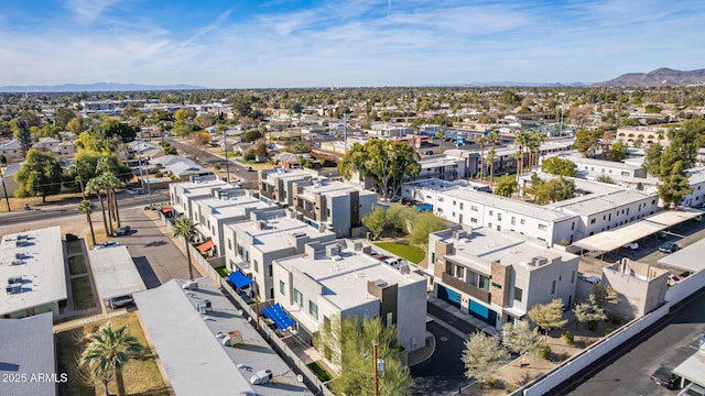 birds eye view of property featuring a mountain view