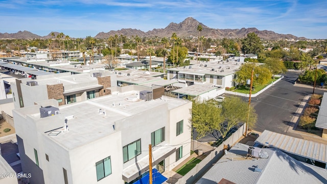 birds eye view of property featuring a mountain view