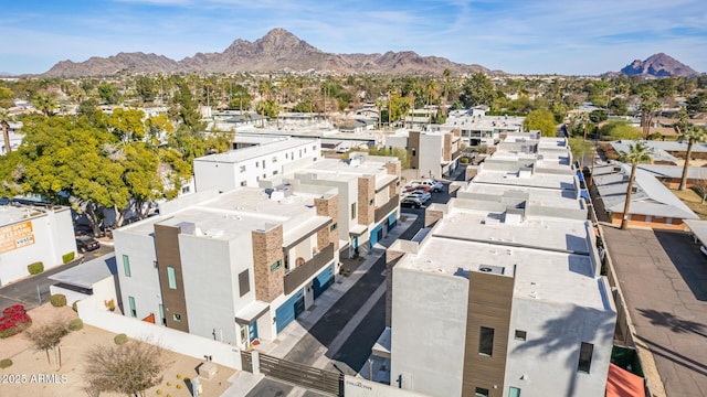 birds eye view of property featuring a mountain view