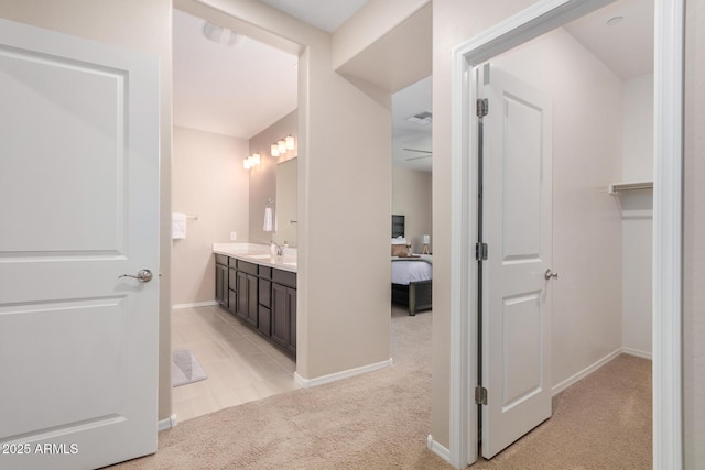 2631 S Sulley Dr Unit 104, Gilbert, AZ 85295 - full bath featuring vanity, baseboards, and ensuite bath