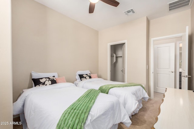 2631 S Sulley Dr Unit 104, Gilbert, AZ 85295 - bedroom featuring light colored carpet, a ceiling fan, and a closet