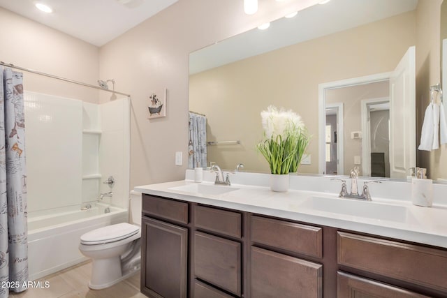 2631 S Sulley Dr Unit 104, Gilbert, AZ 85295 - full bathroom featuring double vanity, toilet, and shower / bath combo with shower curtain