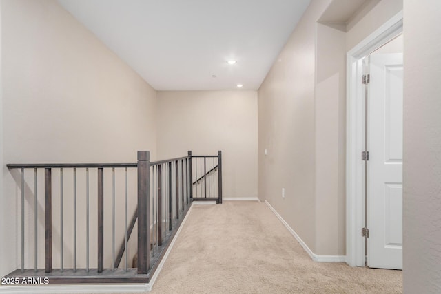 2631 S Sulley Dr Unit 104, Gilbert, AZ 85295 - corridor with carpet flooring, an upstairs landing, baseboards, and recessed lighting