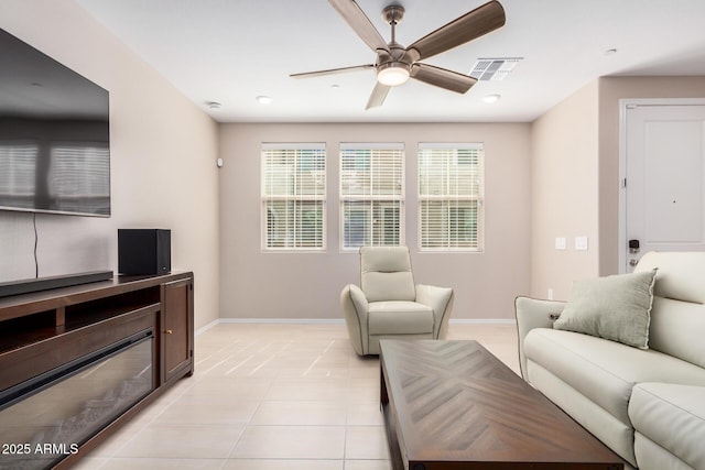 2631 S Sulley Dr Unit 104, Gilbert, AZ 85295 - living area featuring ceiling fan, baseboards, and light tile patterned floors