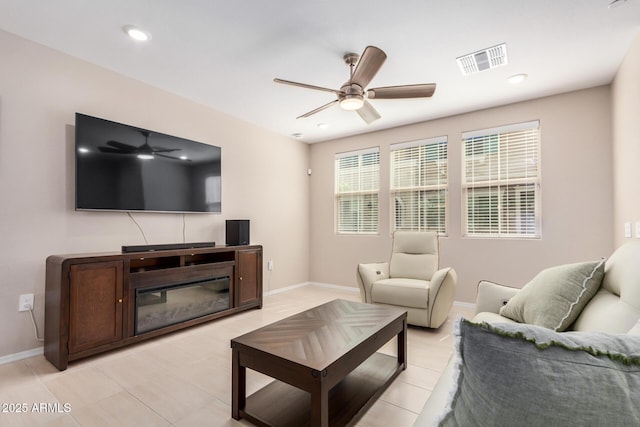 2631 S Sulley Dr Unit 104, Gilbert, AZ 85295 - living area with a ceiling fan, baseboards, and light tile patterned floors