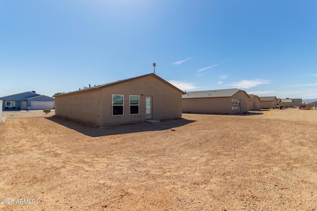 32024 N Redding St, Wittmann, AZ 85361 - back of house with stucco siding