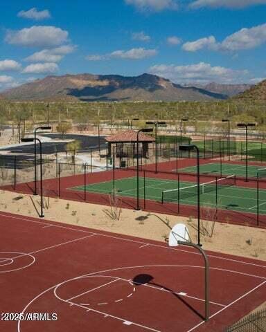 view of basketball court featuring a mountain view