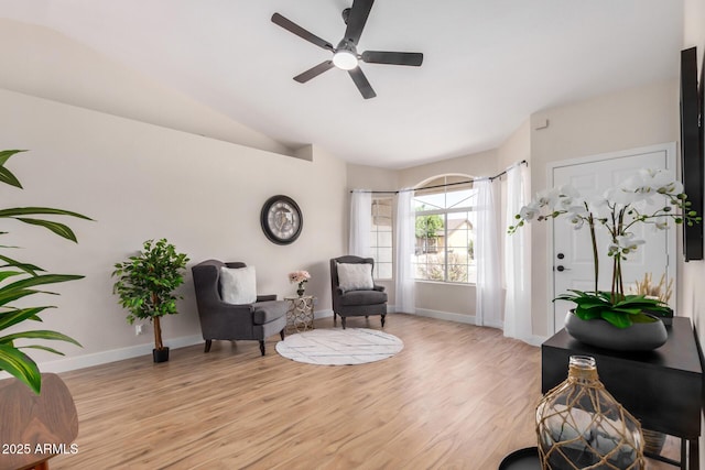 8103 E Dartmouth St, Mesa, AZ 85207 - living area featuring a ceiling fan, baseboards, light wood-type flooring, and lofted ceiling