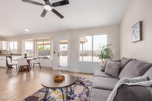 8103 E Dartmouth St, Mesa, AZ 85207 - living room with light wood-type flooring and a ceiling fan
