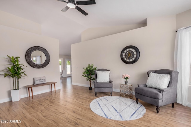 8103 E Dartmouth St, Mesa, AZ 85207 - living area with a ceiling fan, wood finished floors, vaulted ceiling, and baseboards