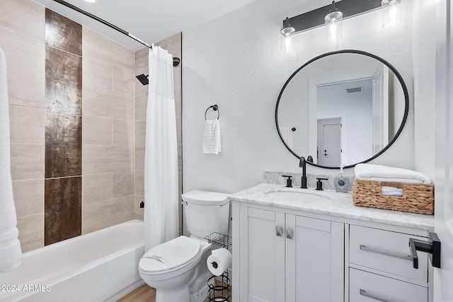 full bathroom featuring vanity, toilet, and shower / bath combo with shower curtain