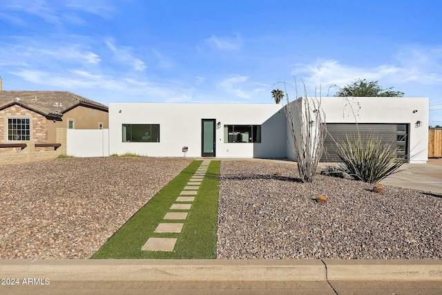 view of front of home featuring a garage