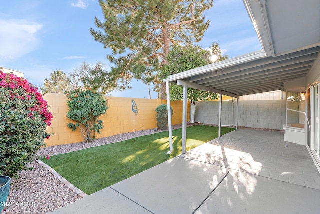 view of patio featuring a fenced backyard