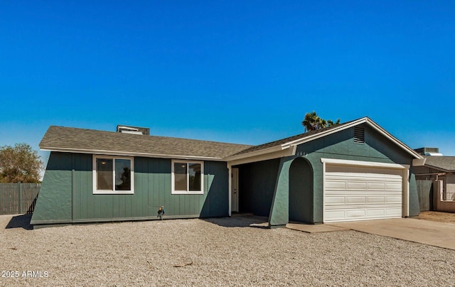 ranch-style home with a garage