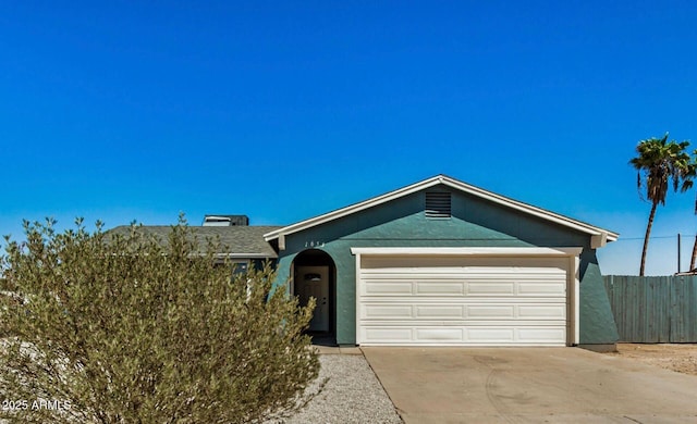 ranch-style house with a garage