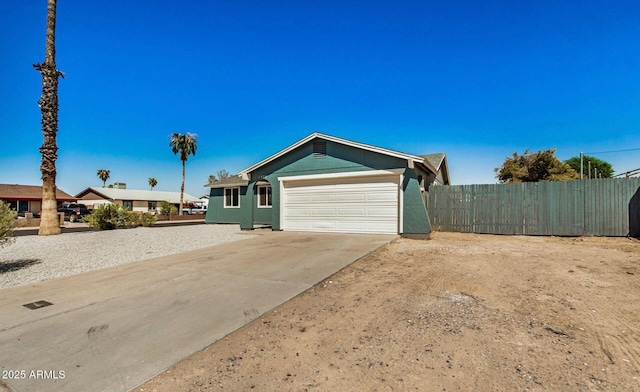 ranch-style home with a garage