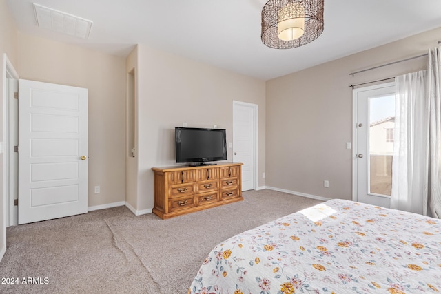 unfurnished bedroom featuring light carpet