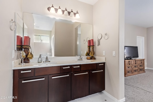 bathroom featuring tile patterned floors and vanity