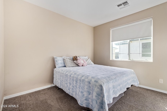 bedroom featuring carpet