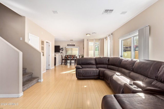 living room with light hardwood / wood-style floors