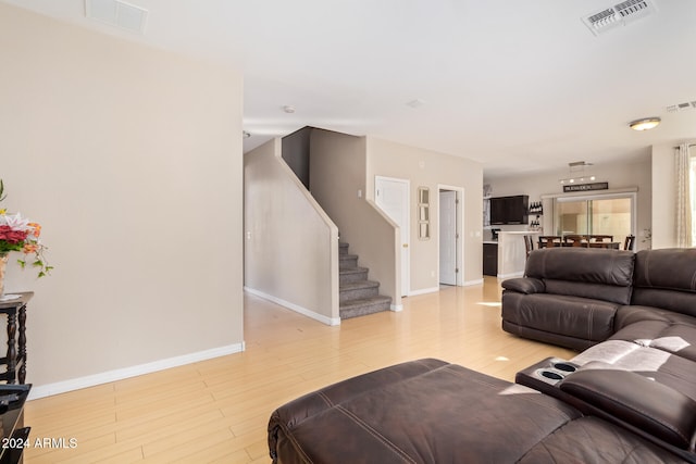 living room with light hardwood / wood-style floors