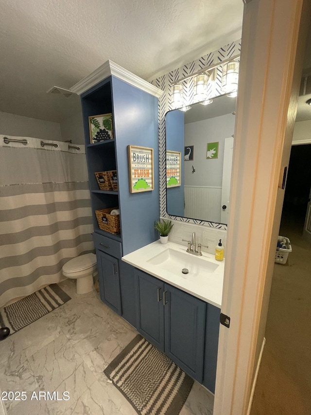 full bath featuring visible vents, toilet, marble finish floor, a textured ceiling, and vanity