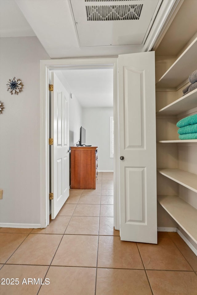 5751 N Kolb Rd Unit 7102, Tucson, AZ 85750 - hall featuring baseboards and light tile patterned flooring