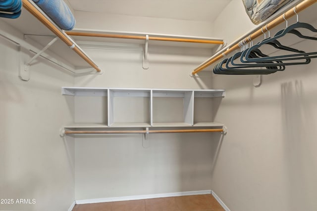 5751 N Kolb Rd Unit 7102, Tucson, AZ 85750 - walk in closet featuring tile patterned floors