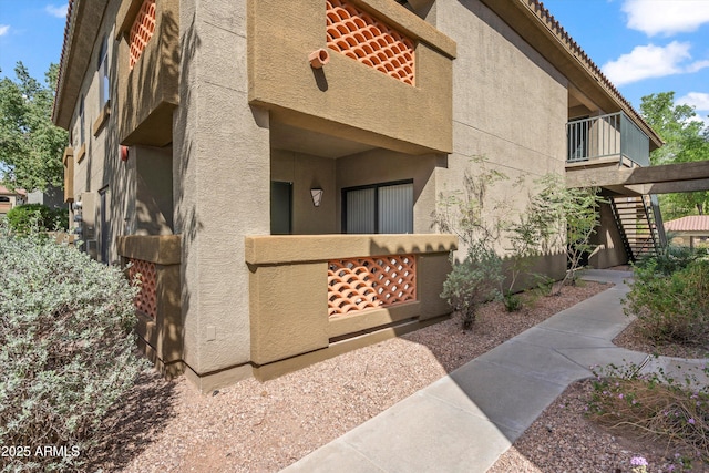 5751 N Kolb Rd Unit 7102, Tucson, AZ 85750 - exterior space featuring stucco siding and stairs