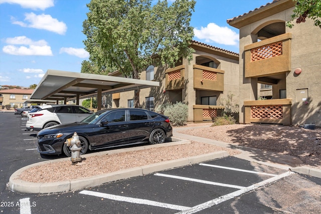 5751 N Kolb Rd Unit 7102, Tucson, AZ 85750 - view of partially covered parking lot