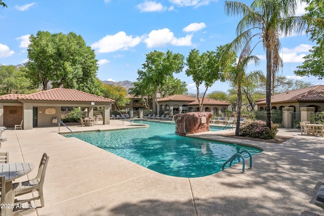 5751 N Kolb Rd Unit 7102, Tucson, AZ 85750 - pool featuring a patio, fence, and a mountain view