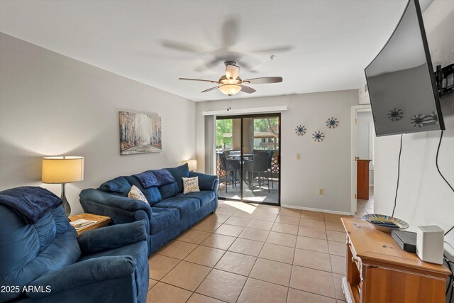5751 N Kolb Rd Unit 7102, Tucson, AZ 85750 - living room featuring ceiling fan, light tile patterned flooring, and baseboards