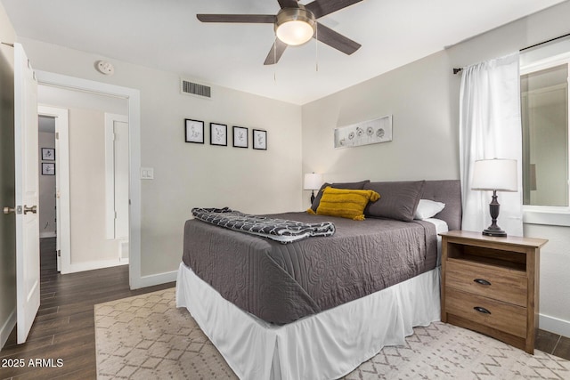 bedroom featuring wood-type flooring and ceiling fan