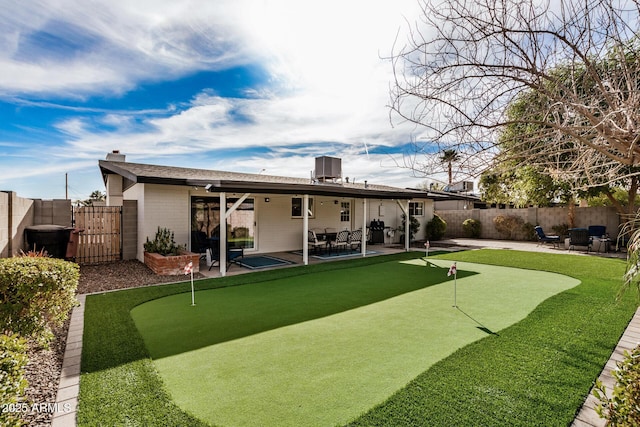 back of property featuring a patio and central AC unit