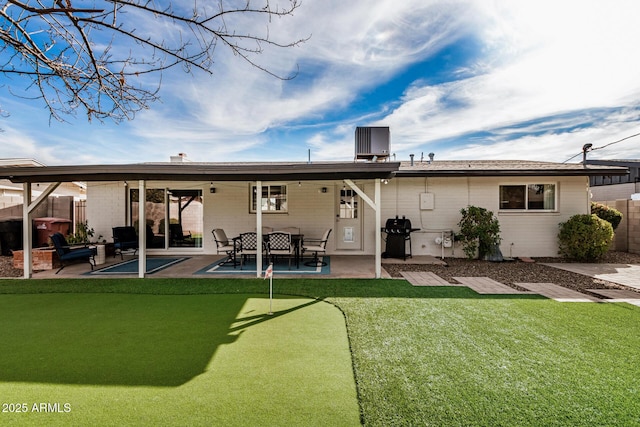 back of house featuring a patio area